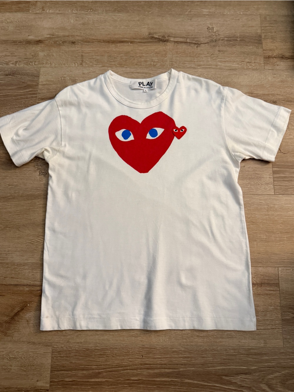 Comme des Garcons PLAY White T-Shirt with Red Heart and Blue Eyes Graphic